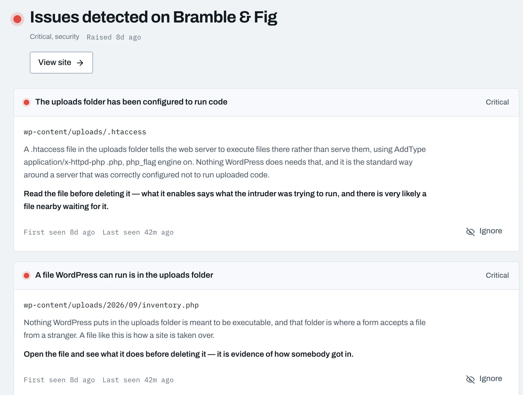 A SiteRack alert page headed Issues detected on Bramble & Fig, listing an uploads folder configured to run code and an executable file found there.